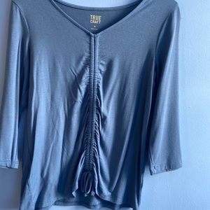 A blue long sleeve shirt